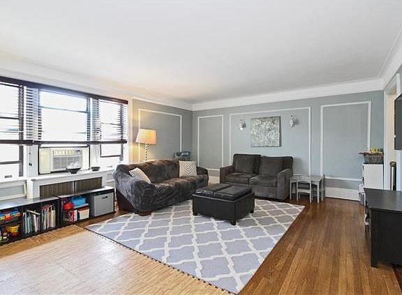 Living room off entrance foyer.Great natural sunlight