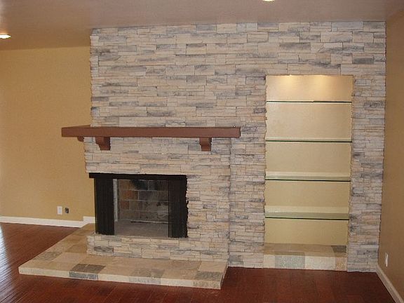 Beautiful stacked stone fireplace!