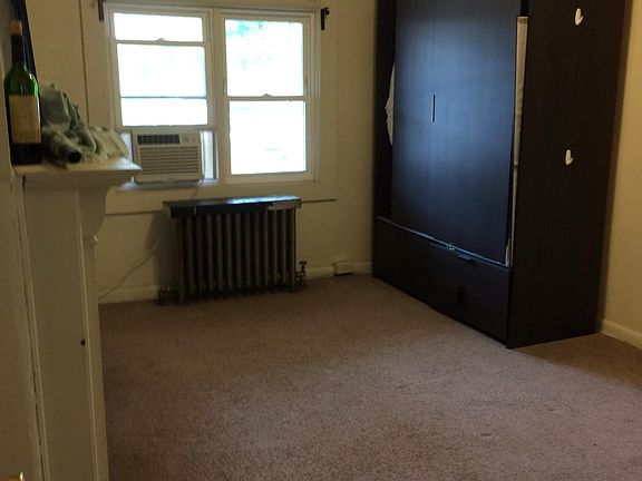 The wardrobe has been replaced with a smaller one.