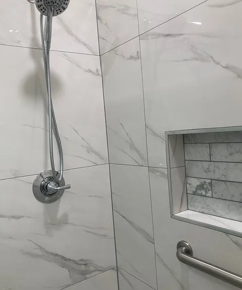 adult metal bar handle in shower