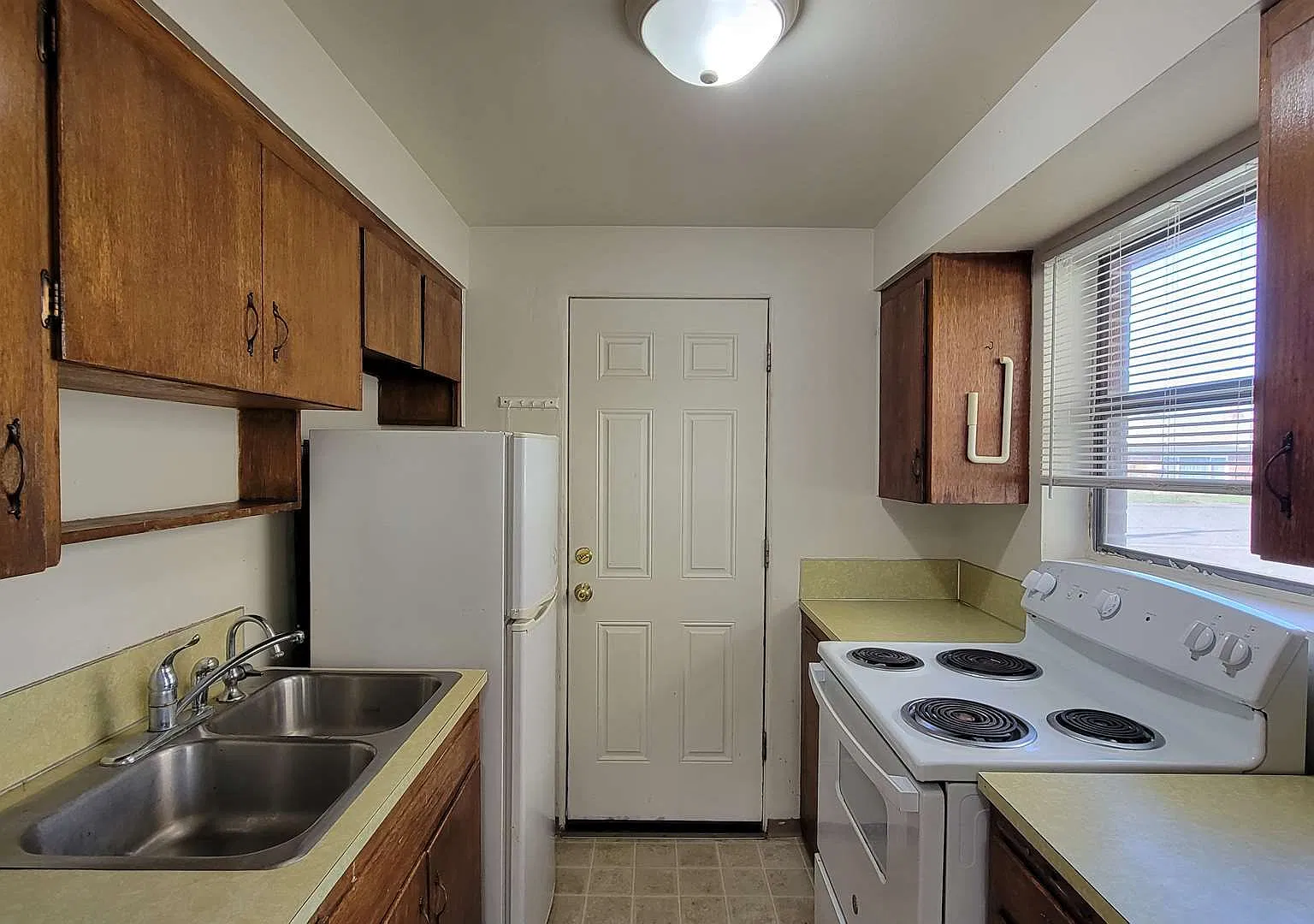 Adorable Single-Level with Washer/Dryer Hookups, Fenced Yard, & Carport! — Photo 4