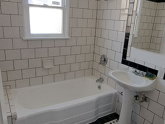 bathroom 7'x8' square feet. Bathtub recently reglazed.
