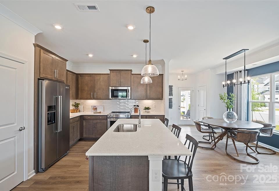 Builder representative of kitchen
