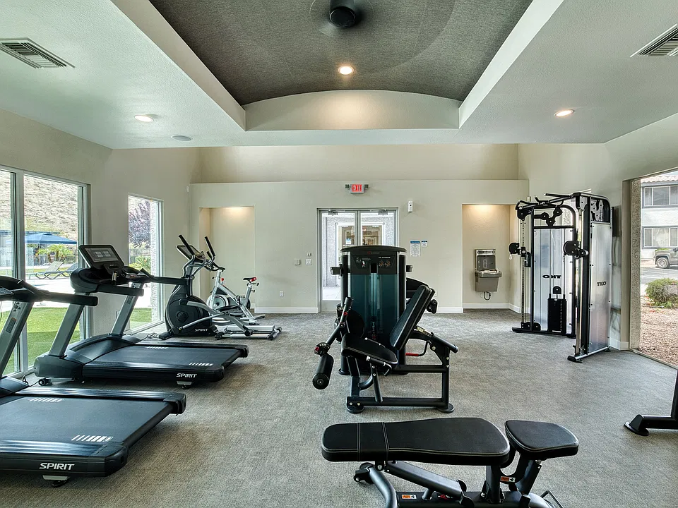 Skip the gym membership and get the free weights and cardio on site.