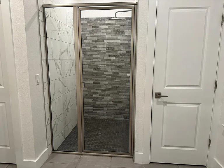 Primary Bath: Large shower and door to private toilet