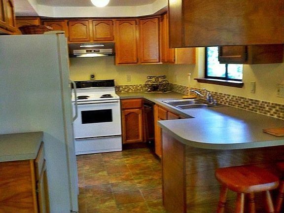 Recent upgrades include designer tile back splash, nw GFCI oulets, new paint and new register vents throughout the entire house.