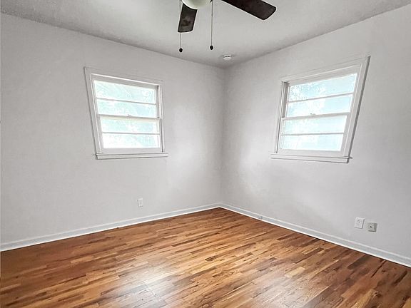 Two bedrooms with freshly refinished hardwood floors