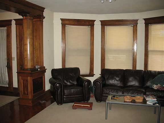 Living room columns and oversized windows