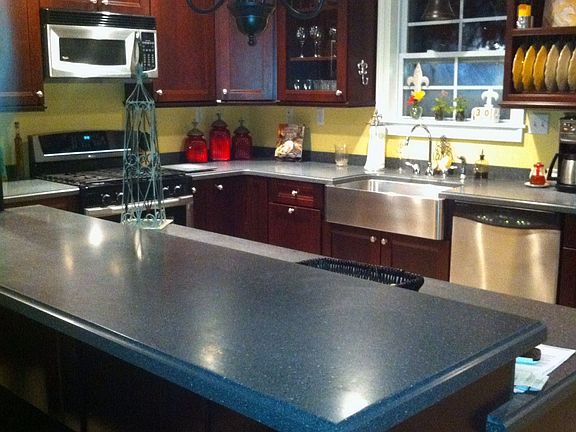 Corian countertops and mahogany cabinets