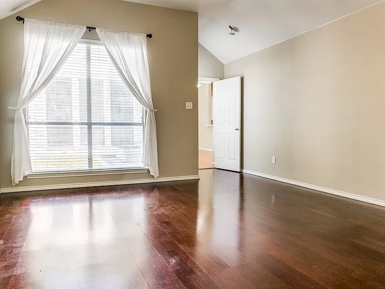Master bedroom is in back & overlooks patio.