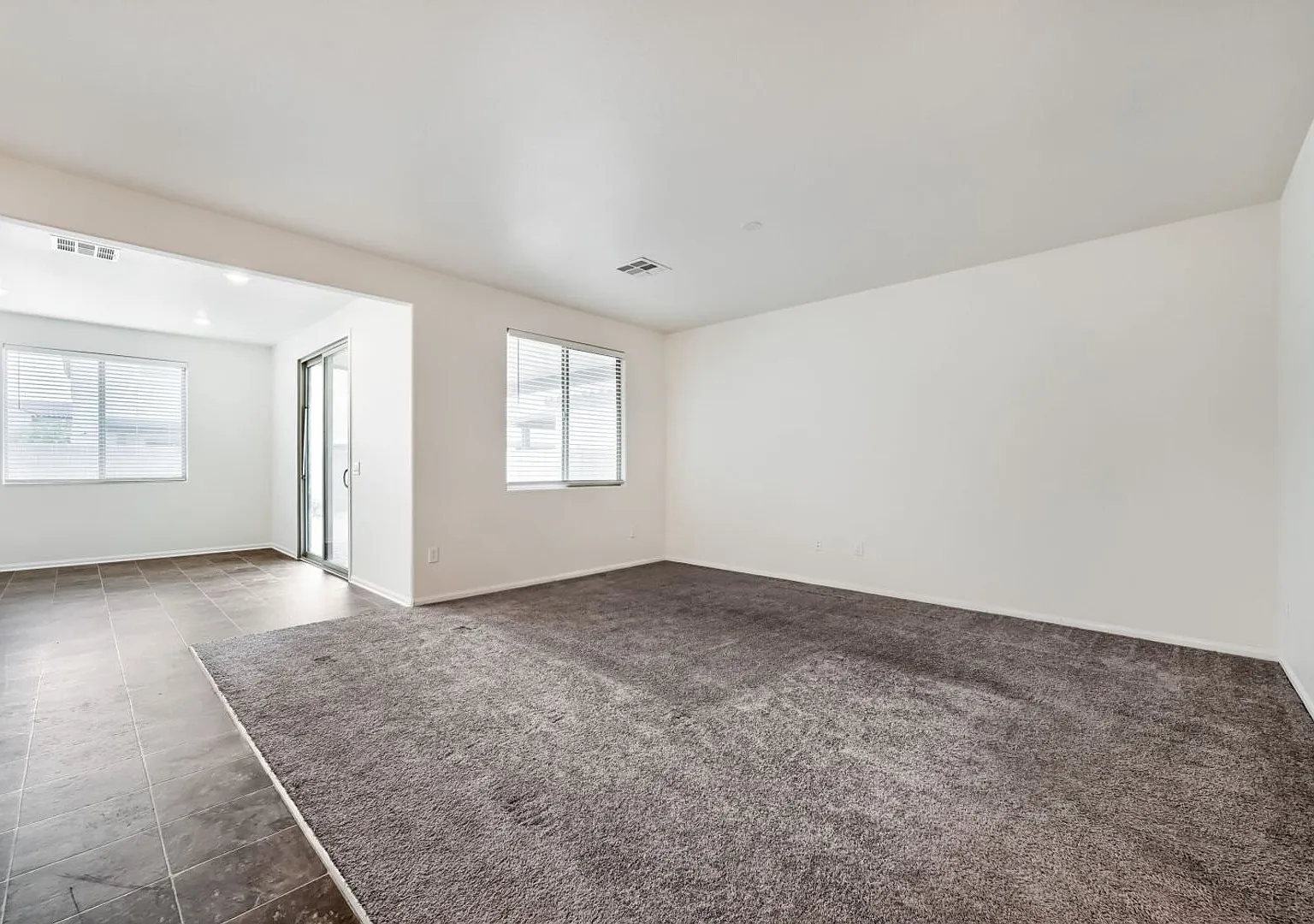 Bright & Spacious 3-Bedroom Home with Covered Patio! — Photo 2