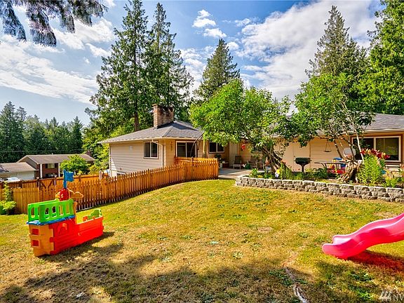 Backyard is large and fully fenced! Patio space for entertaining.