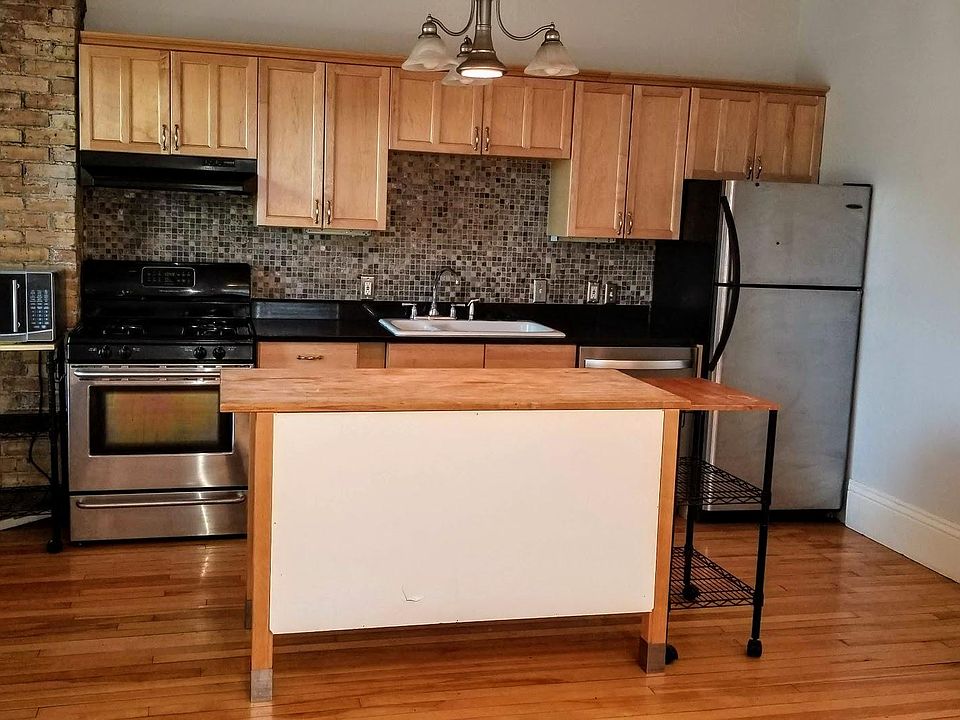 Great open layout with hang out, lounge, TV, Study area..... lots of options with this space!