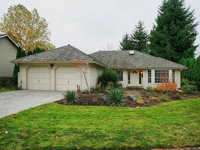 Lovely single-level home with Newer Cedar Shake Roof and new concrete driveway. MOVE-IN READY!