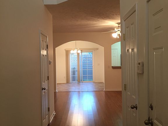 View from entrance door; garage door and closet in entry