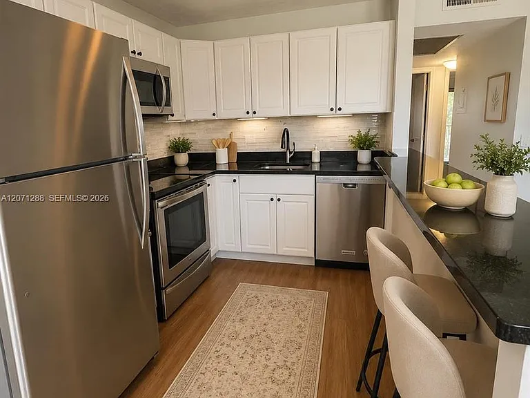 13450 SW 3rd St #404D — Photo 4