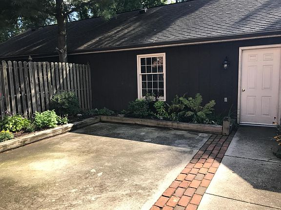 Private Fenced In Courtyard with Attached 2.5 Car Garage