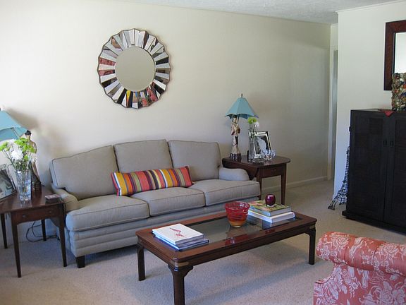 formal living with built-ins and linen closet