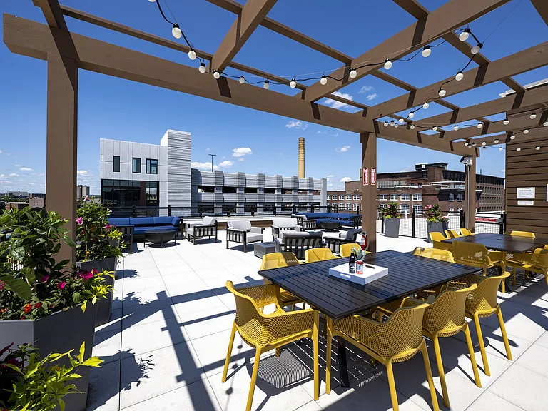 Rooftop Terrace With Seating And Pergola