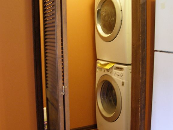 laundry room with really great new washer dryer