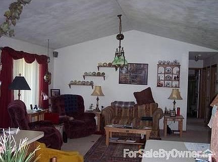 Living : Ceiling light does not stay, family heirloom. Will replace with desired fixture.