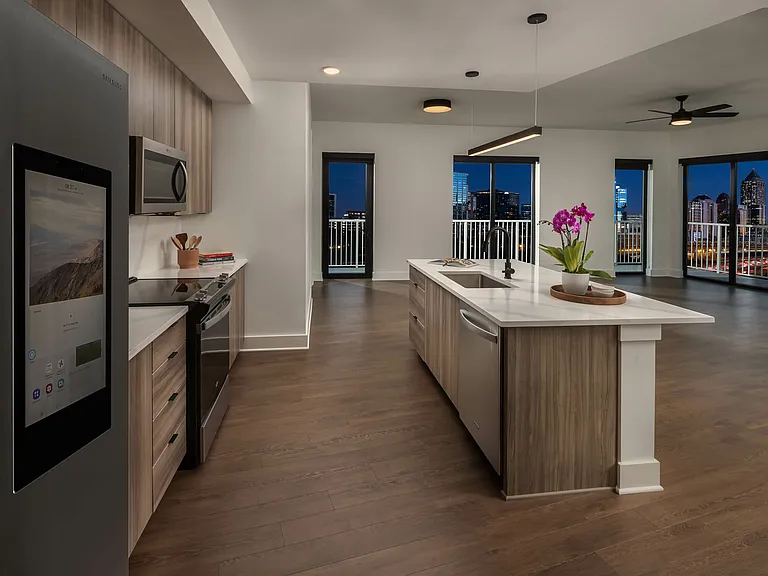 Island kitchens with stainless steel ENERGY STAR appliances and smart refrigerators