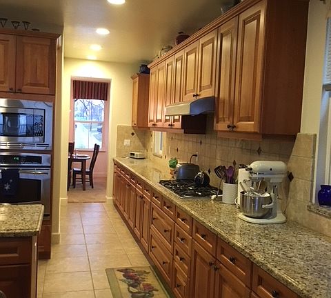 Cherry cupboards throughout