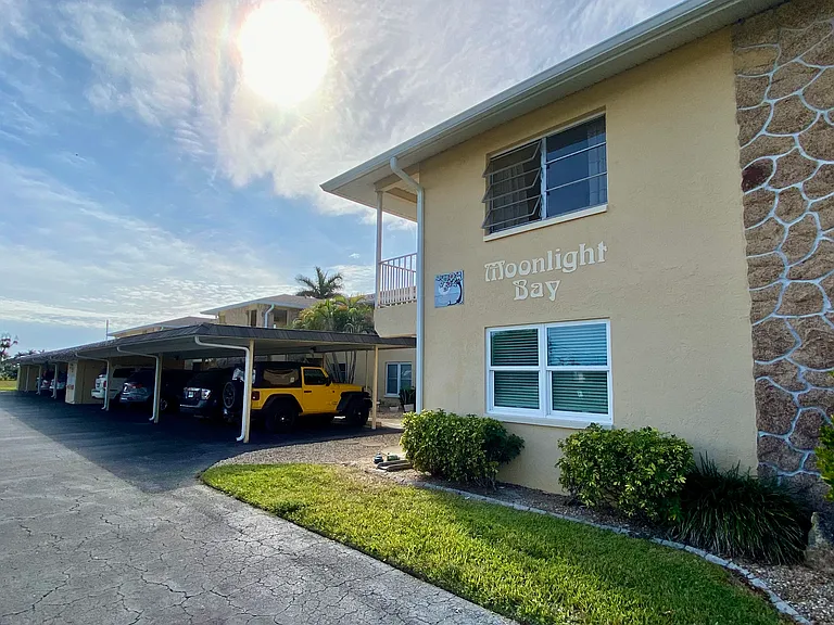 Moonlight Bay, 10 units, dedicated carport parking right outside your door (far left corner)