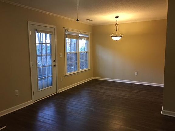 Dining Area viewed from living room. Fireplace just to the left.