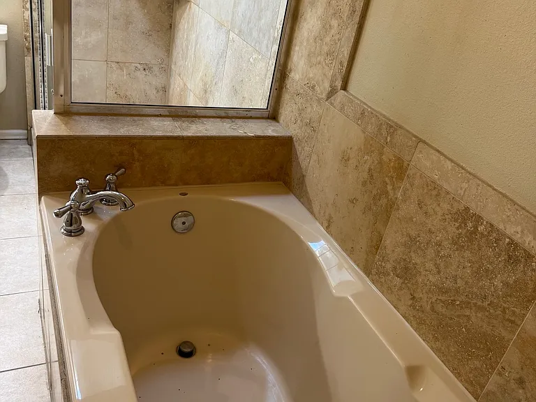 Enjoy the deep jetted tub