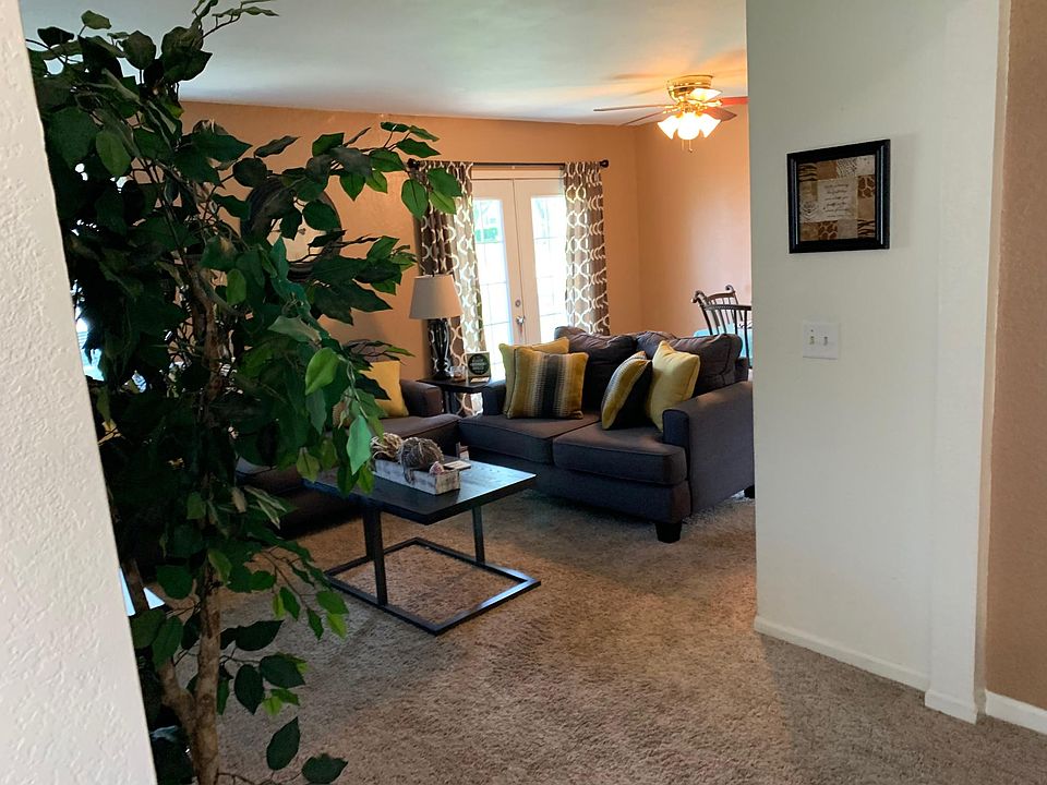 Inviting open floor plan. Fresh light-gray paint throughout. Pictures are of similar unit.