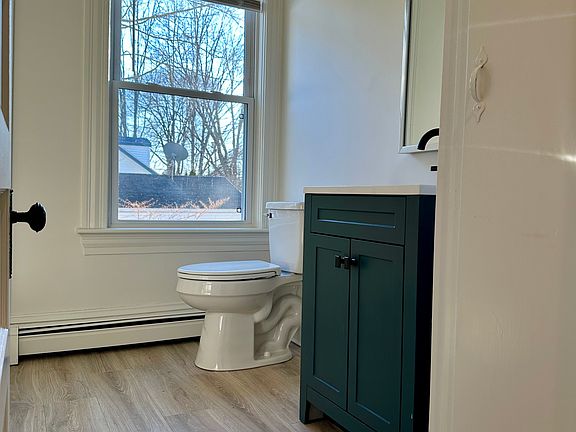 Bathroom with tub shower.