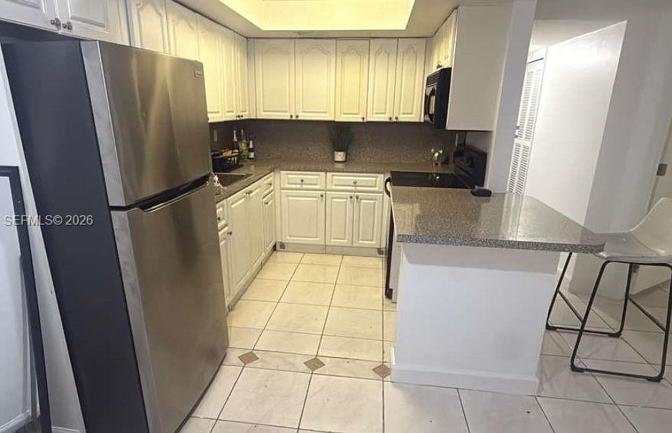 2nd image of 3090 Coral Springs Dr #1-R