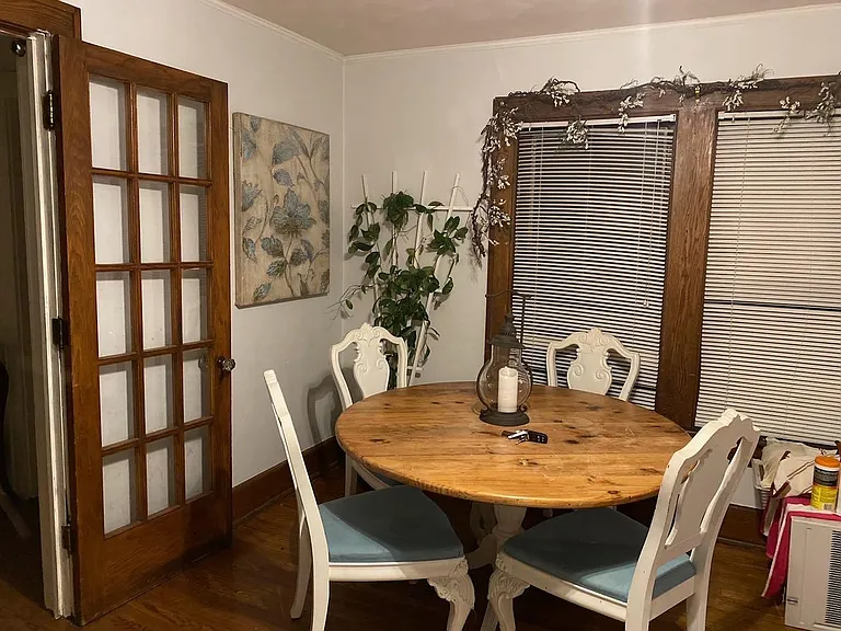 Dining Area w/ Two Large Windows for Natural Lighting! All trim and doors have been painted white.