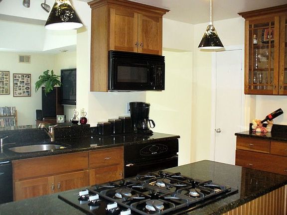 Remodeled Kitchen w/ Cherry Cabinets & Granite Countertops