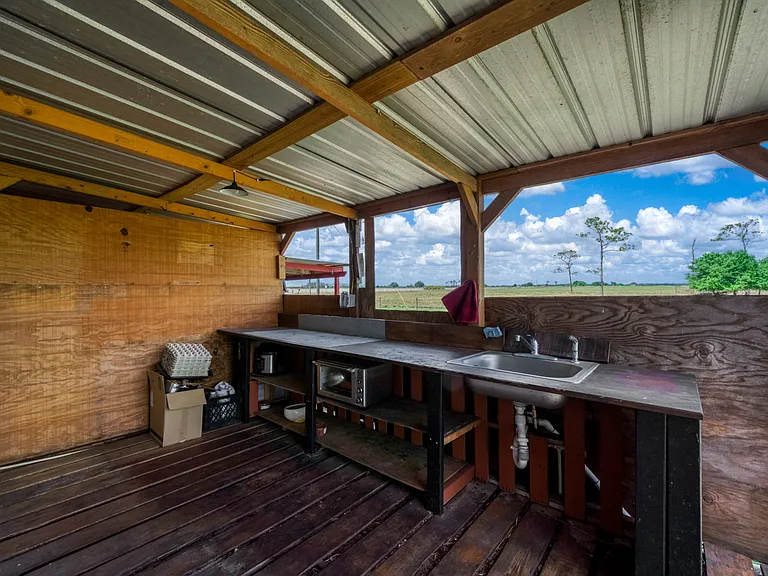 exterior rustic kitchenette of main house