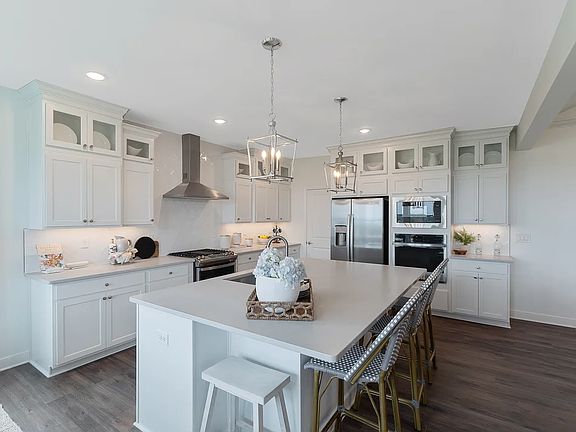 Kitchen with quartz island countertops
