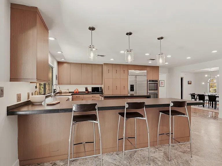 #GuardianRealty 3007 La Mesa Dr 1 story mid-centry modern henderson rental home luxury kitchen breakfast island_07102026