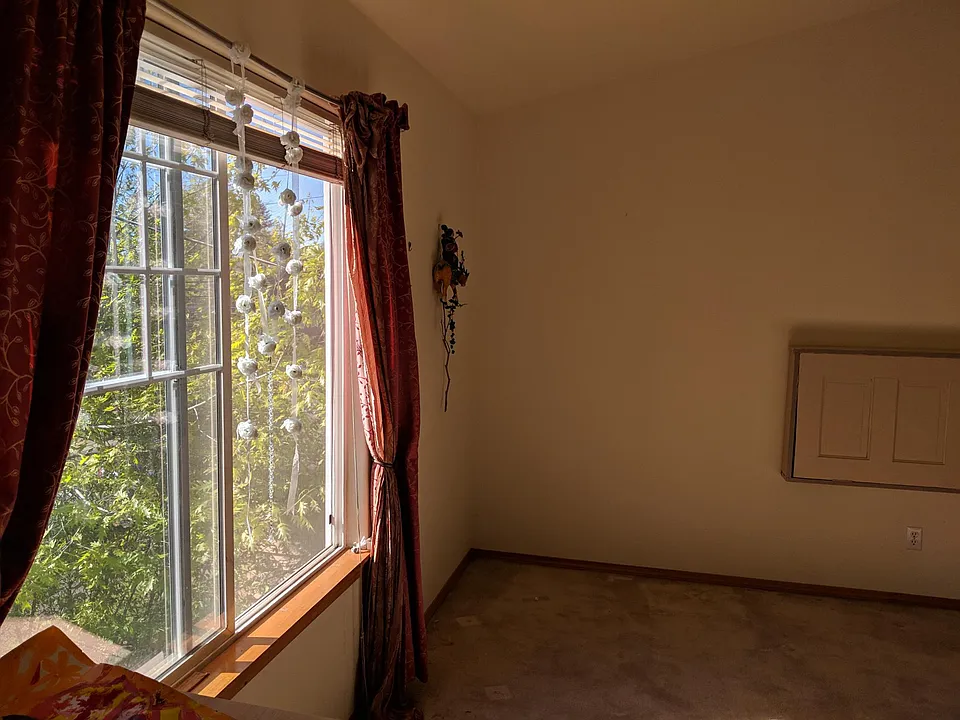 Stunning window to the master bedroom, looking out to Hurst Street as well as the driveway. I love that it allows one to see who is about to enter the property. My vigil window I called it, since it lets you see it all.