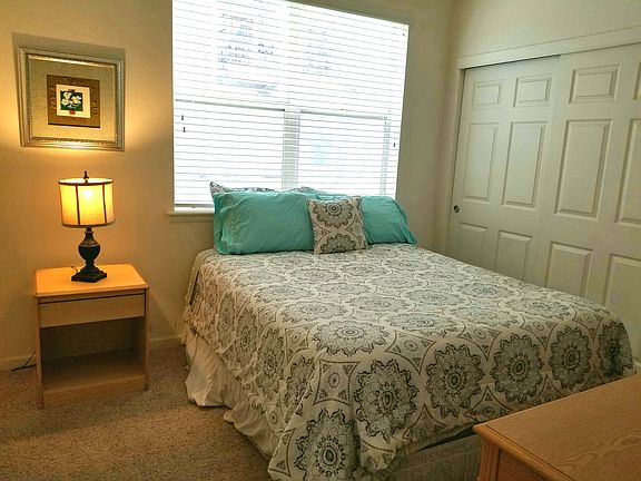 SECOND BEDROOM HAS A QUEEN SIZED BEDROOM ADJACENT TO THE BATHROOM