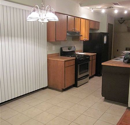 Large Tiled Kitchen with stainless appliances