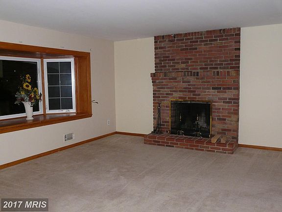 Living Room with wood burning fireplace