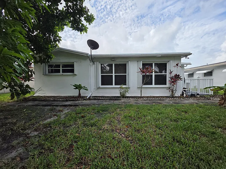 7195 NW 9th Ct — Photo 17