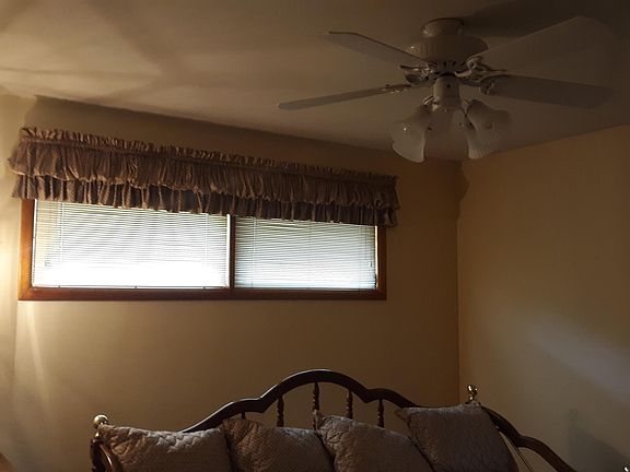 Both bedrooms have these windows; overhead ceiling fans/lights and large closets