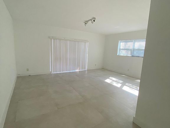 Large Living room overlooking the canal, with open plan space for a dining room and a living room.
