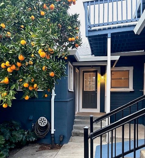 Unit B Front Entrance and Side Patio