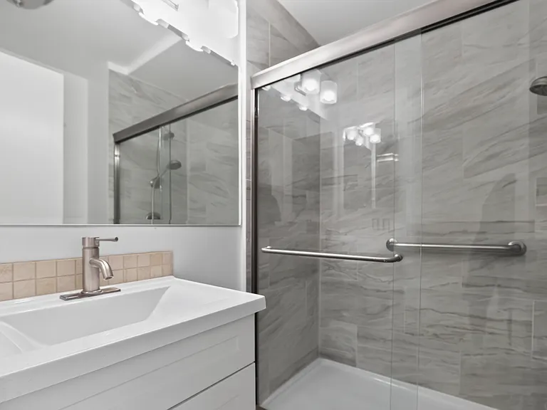 Downstairs bathroom with walk in shower.