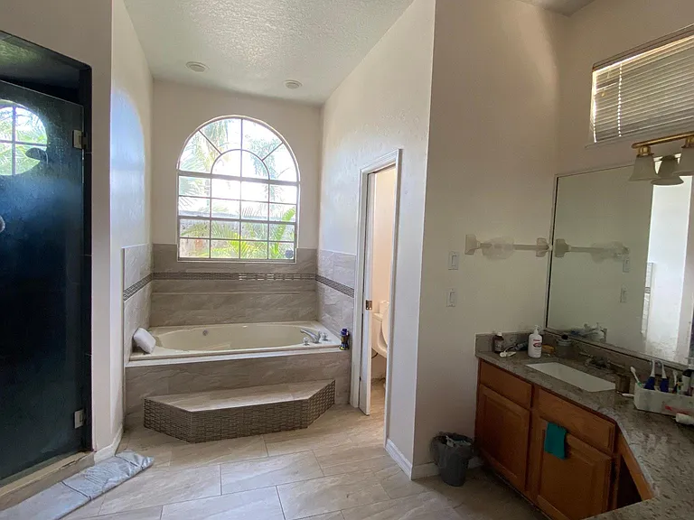 Master bath with jacuzzi tub n his and hers sinks