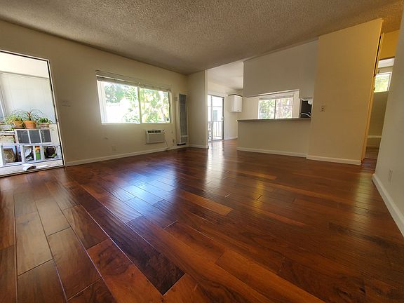 Living Room Hardwood Floors.
Lots of Sunlight.
