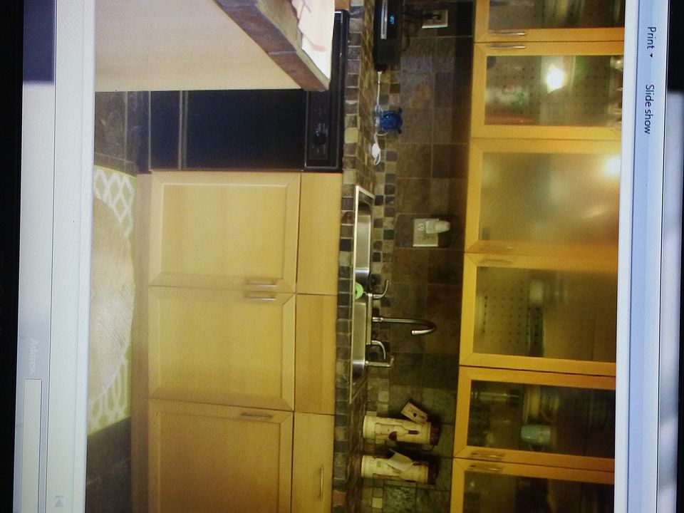Kitchen, ceramic tile on countertop and glass cabinet, p